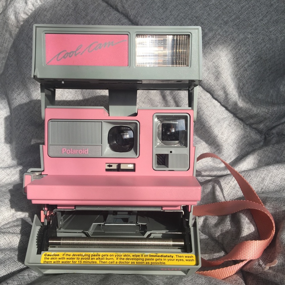 pink and grey vintage polaroid cool cam 600